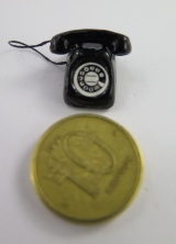 Bild p **Miniatyr** Telefon i metall